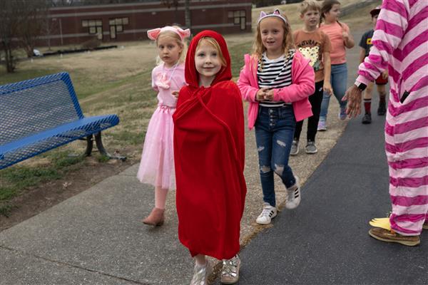 teacher in red costume